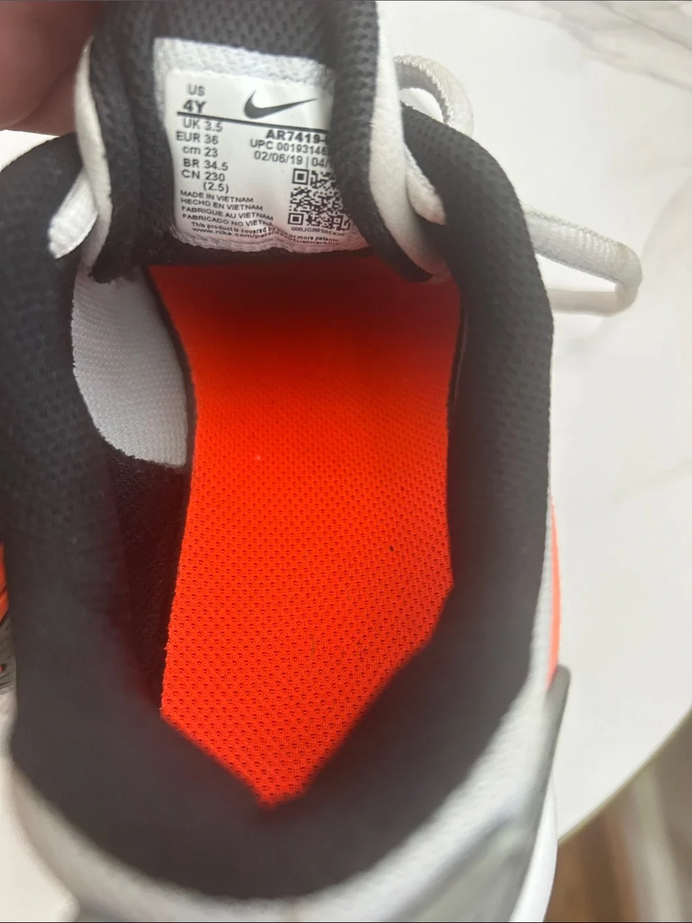 Nike Air Kids Grey Sneakers with Orange Swoosh